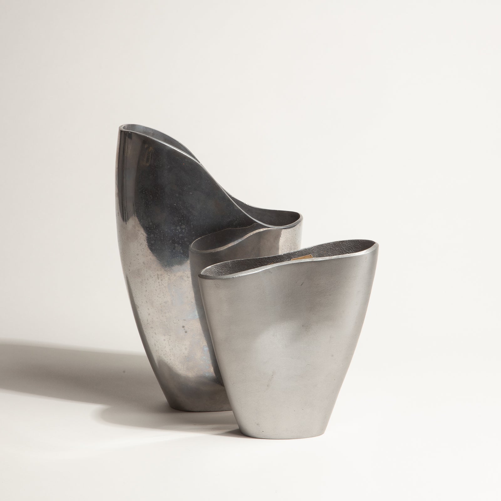 Pair of Aluminum Vases